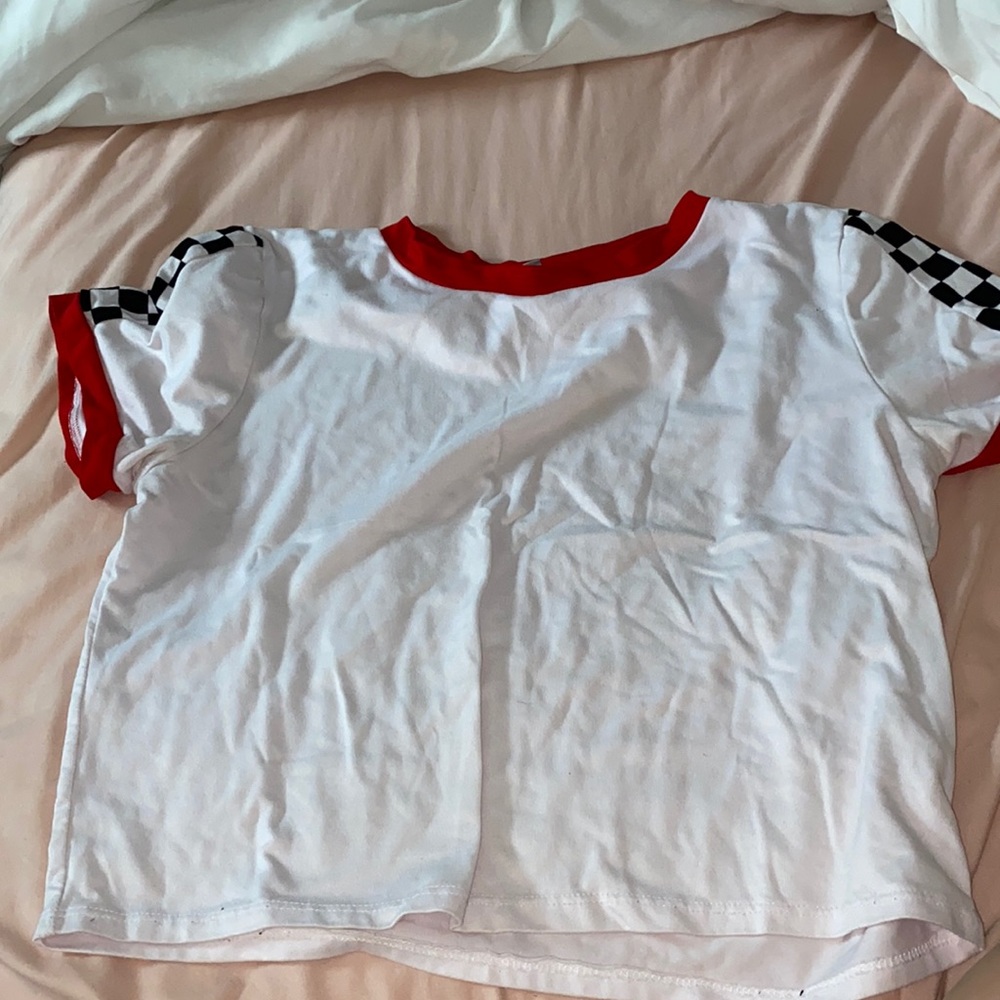 White and red checkered short sleeve shirt.